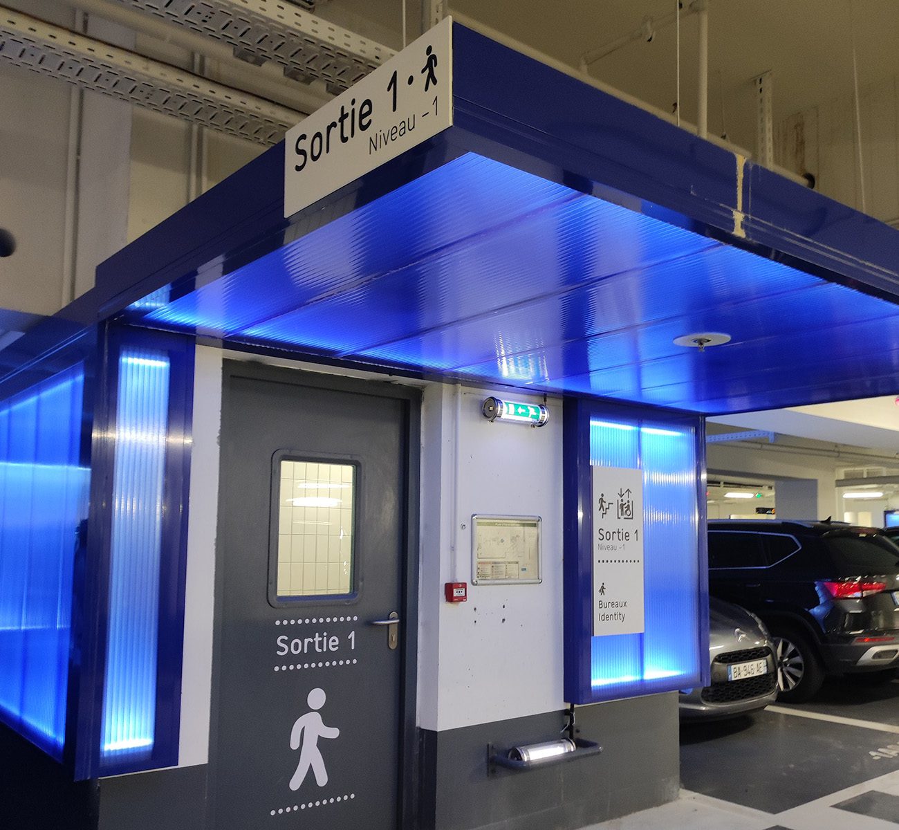 Vue d'ensemble du dispositif mis en place sur chaque sortie piétonne au sein du parking